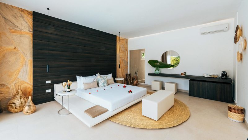 Ycona Luxury Resort in Zanzibar features private beachfront villas surrounded by lush tropical gardens and sustainable architecture.