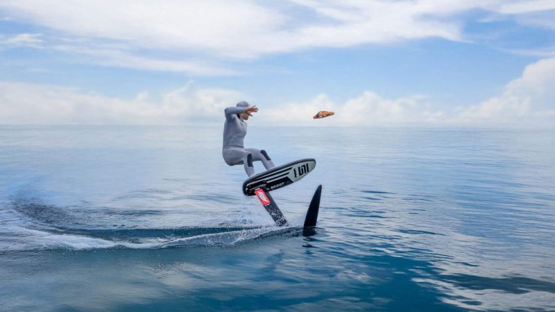 HoverAir Aqua drone can float upright on the water’s surface with an orange buoyant frame.