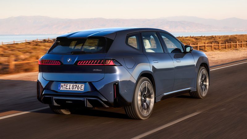 The 2026 BMW iX3, an all-electric SUV, showcases the Neue Klasse design with its slim kidney grilles, wagon-like stance, and futuristic Panoramic iDrive interior.