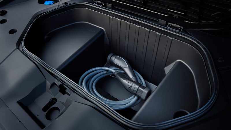 The 2026 BMW iX3, an all-electric SUV, showcases the Neue Klasse design with its slim kidney grilles, wagon-like stance, and futuristic Panoramic iDrive interior.