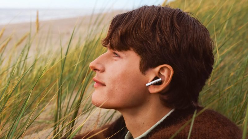 The Bang & Olufsen BeoGrace earphones boast a sleek, minimalist design that showcases luxury craftsmanship, premium audio performance, and modern wireless technology.