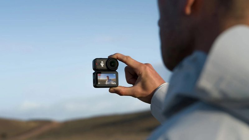 DJI Osmo Nano compact action camera with 4K/120fps recording, waterproof design, gesture controls, and modular dock for extended battery life.