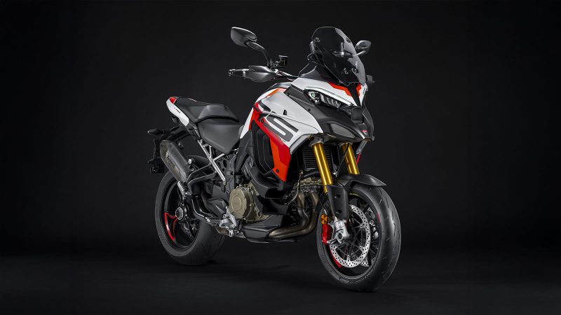 Ducati Multistrada V4 RS is a high-performance adventure motorcycle in striking Ducati Corse livery, featuring aerodynamic design, powerful V4 engine, and advanced touring technology.