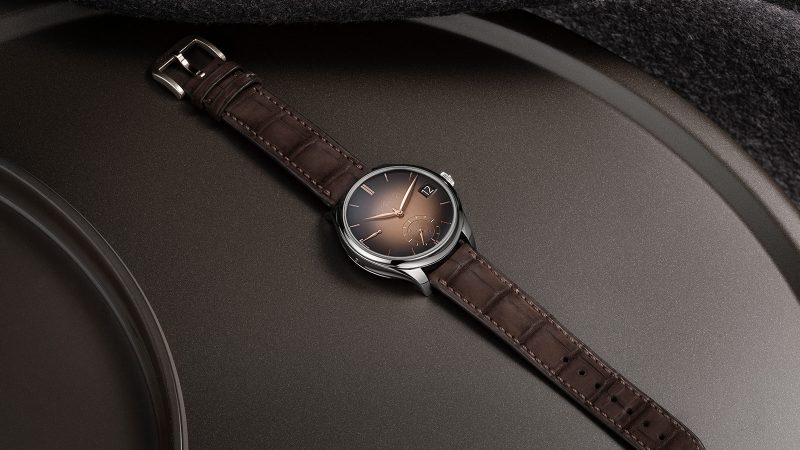 H. Moser & Cie Endeavour Perpetual Calendar Smoked Salmon with smoked salmon griffé dial, white gold case, and hand-wound HMC 800 caliber.