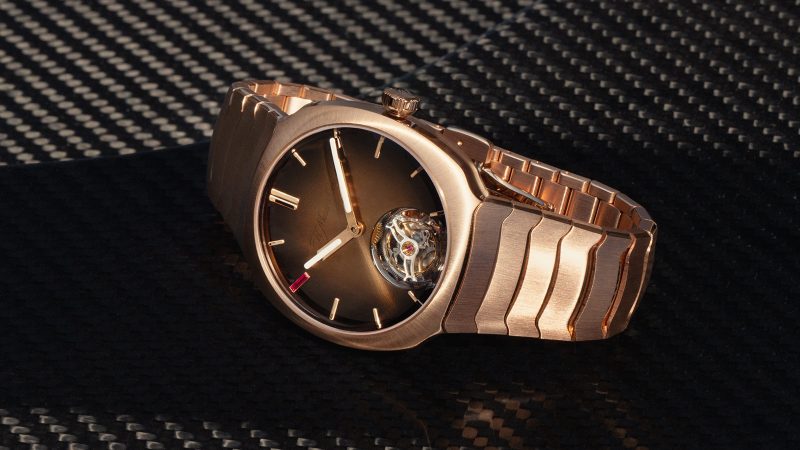 H. Moser & Cie. Streamliner Tourbillon Pierre Gasly watch with chocolate fumé dial, red gold case, and exclusive racing-inspired design.