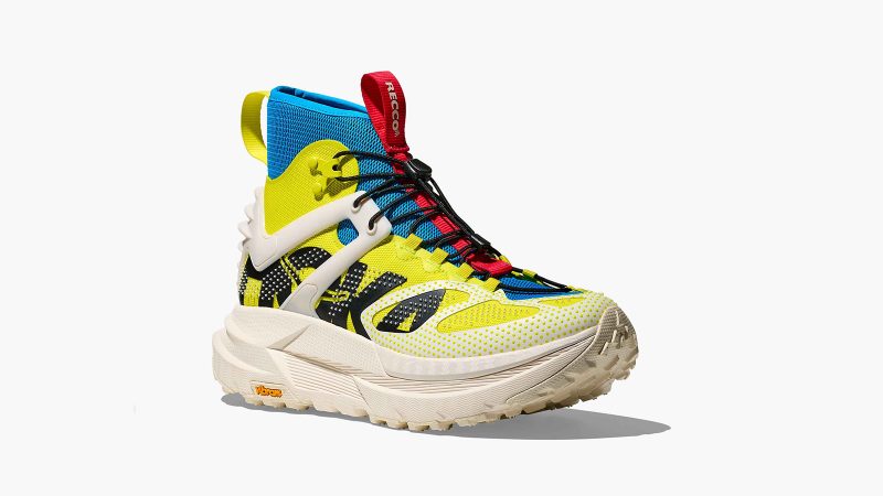 HOKA Mafate X Hike hiking boot in Citrus/Alabaster colorway with carbon fiber plate, RECCO reflector technology, neoprene collar, and cushioned outsole.