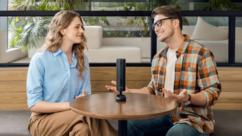 Insta360 Wave AI-powered speakerphone with 8-mic 3D array, smart transcription, adaptive beamforming, and sleek touchscreen interface.