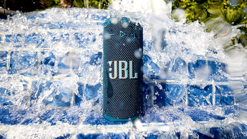 JBL Grip portable Bluetooth speaker with Pro Sound, 12-hour battery life, IP68 waterproofing, and customizable lighting in six bold colorways.