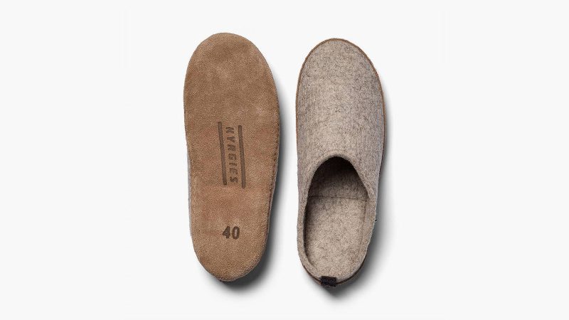 Kyrgies Indoor Wool Slides are minimalist house shoes crafted from sustainable materials with a slip-on design and artisanal construction.