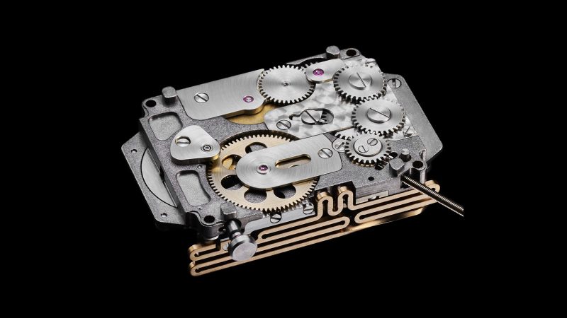 The OTSUKA LOTEC № 9 Free Wheel Maillechort luxury watch features a stainless steel case, a sapphire wrap-around crystal, a jumping hour disc, retrograde minutes, and an exposed tourbillon with chiming gong.