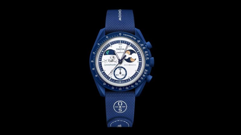 The Omega x Swatch Mission to Earthphase Moonshine Gold Corn Moon edition features a blue dial, Snoopy and Woodstock, and popcorn-box moon disc detail.