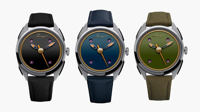 The Singer Caballero watch with stainless steel C-shaped case, green, black, or blue lacquered dial, inset rubies, and signature orange-lumed hands on a textile or leather strap.