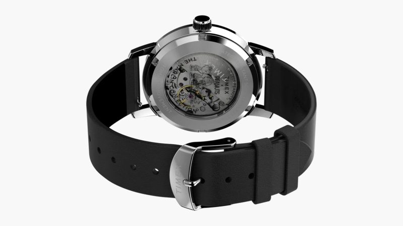 The Timex x Peanuts Marlin Automatic Space watch with Snoopy floating second hand, 40mm stainless-steel case, silver sunray dial, and eco-friendly leather strap.