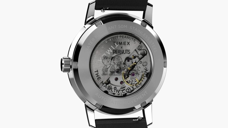 The Timex x Peanuts Marlin Automatic Space watch with Snoopy floating second hand, 40mm stainless-steel case, silver sunray dial, and eco-friendly leather strap.