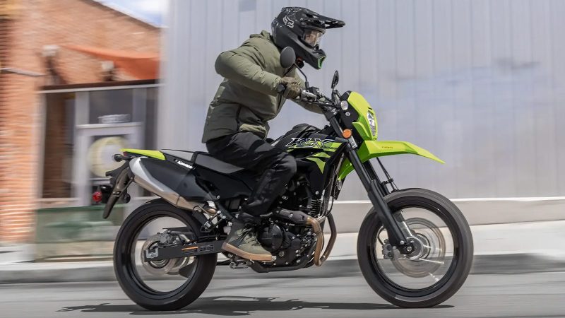 The 2026 Kawasaki KLX230SM ABS shows a sleek supermoto design with 17-inch wheels and aggressive styling.