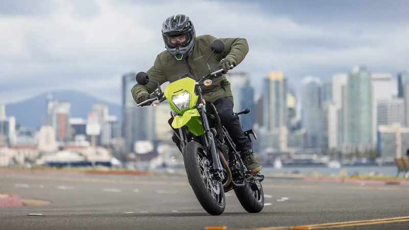The 2026 Kawasaki KLX230SM ABS shows a sleek supermoto design with 17-inch wheels and aggressive styling.