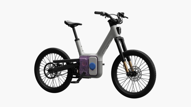 The Also TM-B Launch Edition e-bike in matte silver with a 5-inch digital display and a modular frame, designed by Rivian spinoff for next-gen commuting.