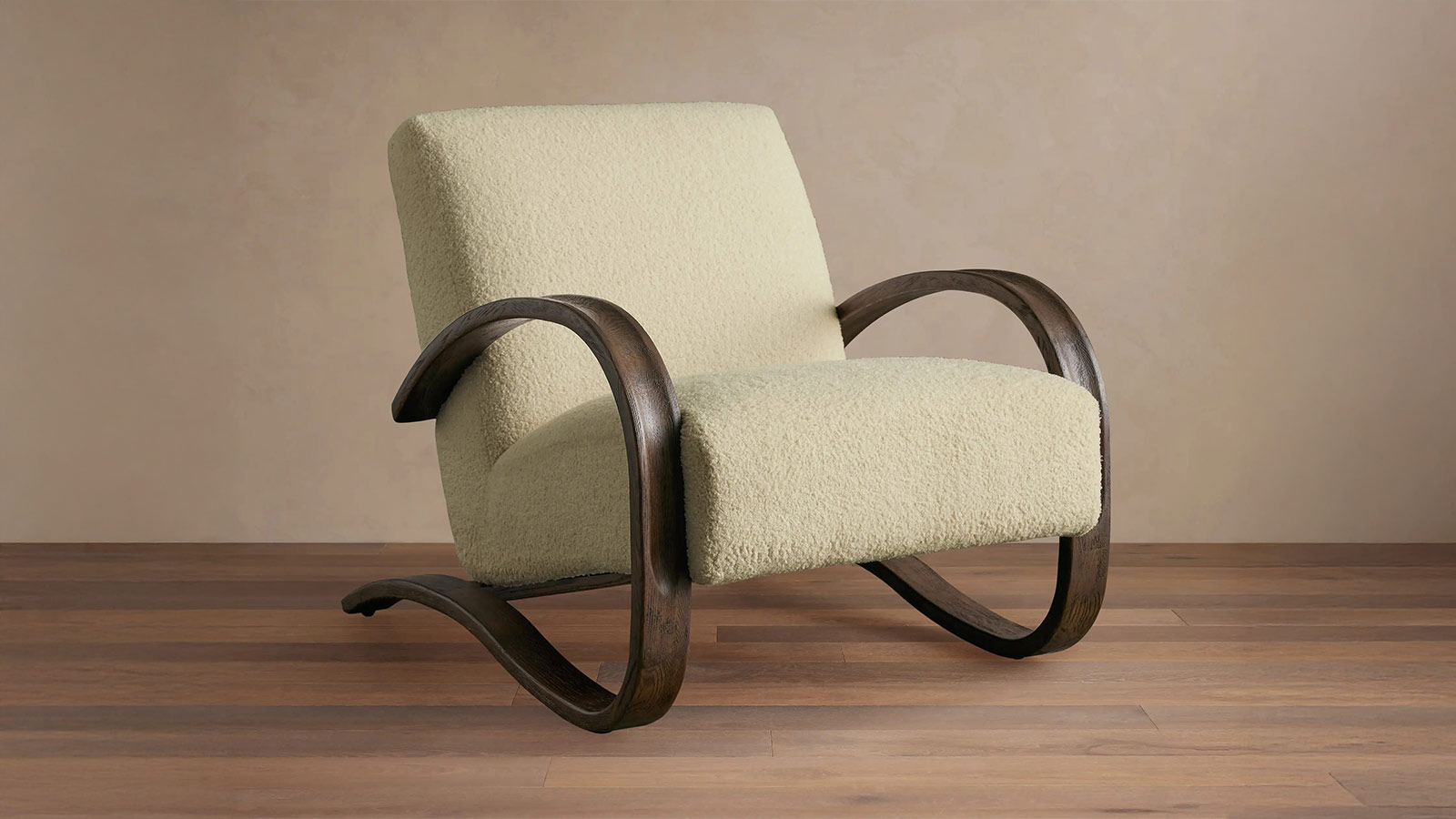 Arhaus Allora Chair in mocha-stained oak, a handcrafted accent chair offering classic comfort for men.