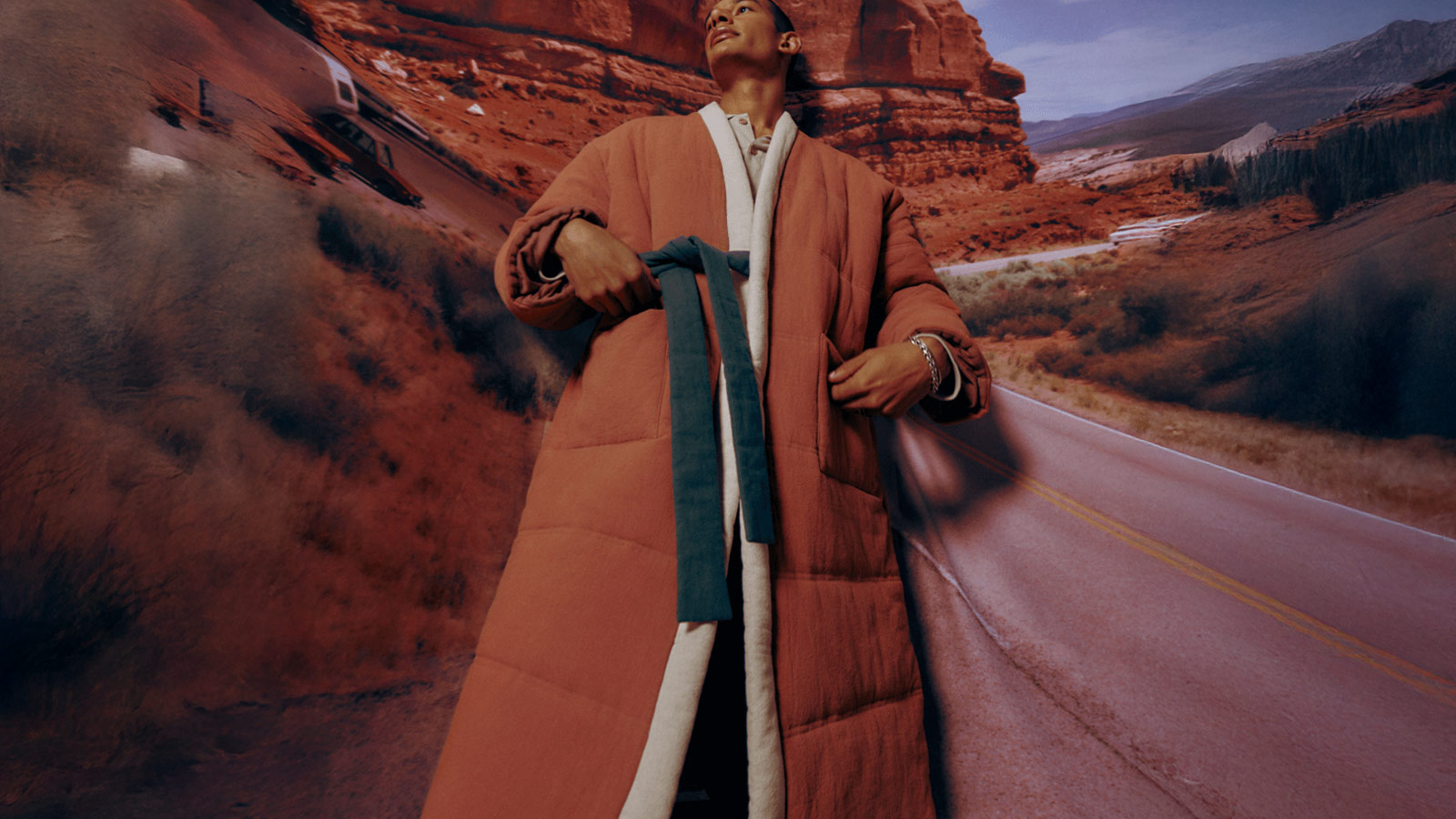 OFFHOURS Homecoat in Red Rock, a quilted hybrid robe-coat for men who blend style and downtime seamlessly.