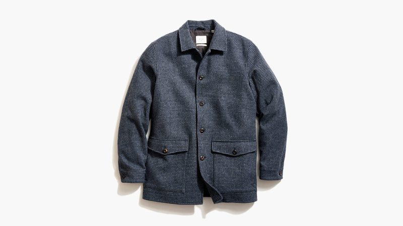 Billy Reid Bennet Overcoat in navy wool blend, styled with dark horn buttons and chambray lining for refined cold-weather versatility.