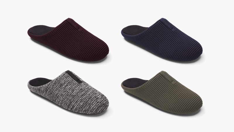 The Bombas Men’s Nest Slipper features a terry lining and cushioned sole on a white background.