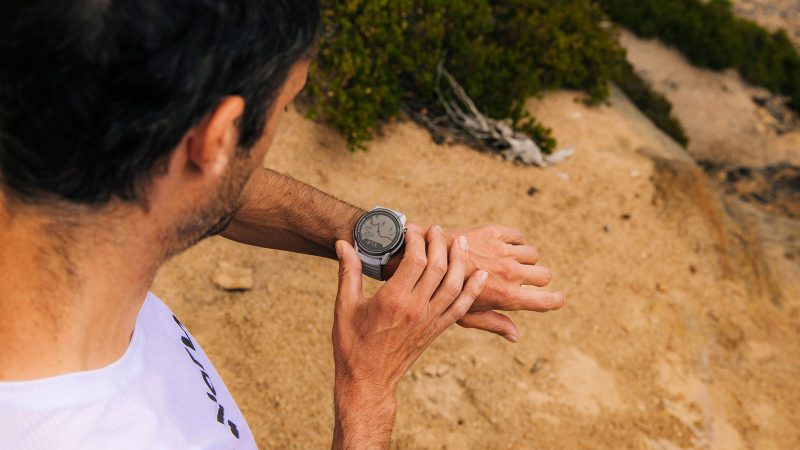The COROS Apex 4 GPS Outdoor Watch features a titanium bezel, a sapphire crystal display, and a rugged, sporty design.