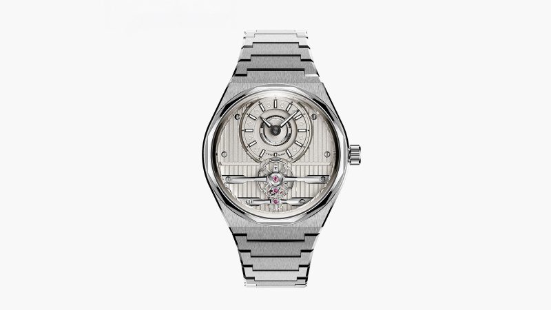 The Christopher Ward x Worn & Wound C12 Brooklynite watch features a champagne dial, an open balance, and Art Deco-inspired detailing.