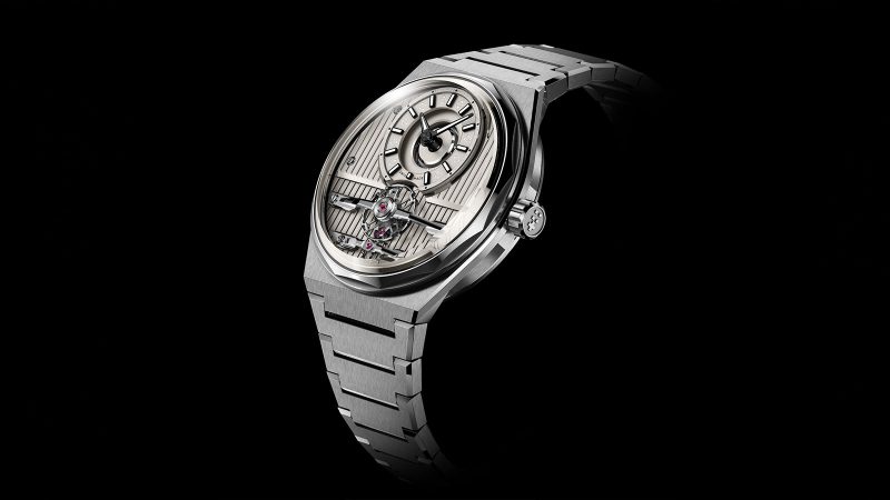The Christopher Ward x Worn & Wound C12 Brooklynite watch features a champagne dial, an open balance, and Art Deco-inspired detailing.
