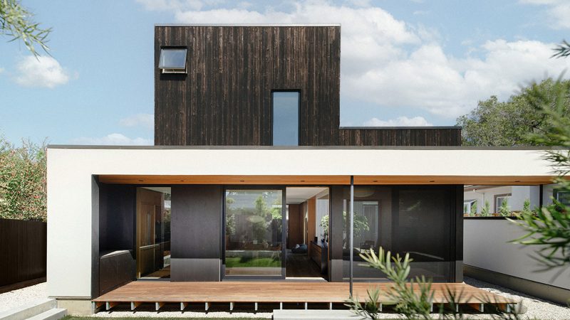 Cupertino Courtyard House exterior by SHED Architecture, featuring white stucco walls and charred-wood upper volume surrounded by lush courtyards.