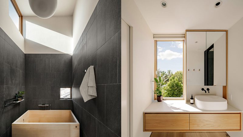 Cupertino Courtyard House exterior by SHED Architecture, featuring white stucco walls and charred-wood upper volume surrounded by lush courtyards.