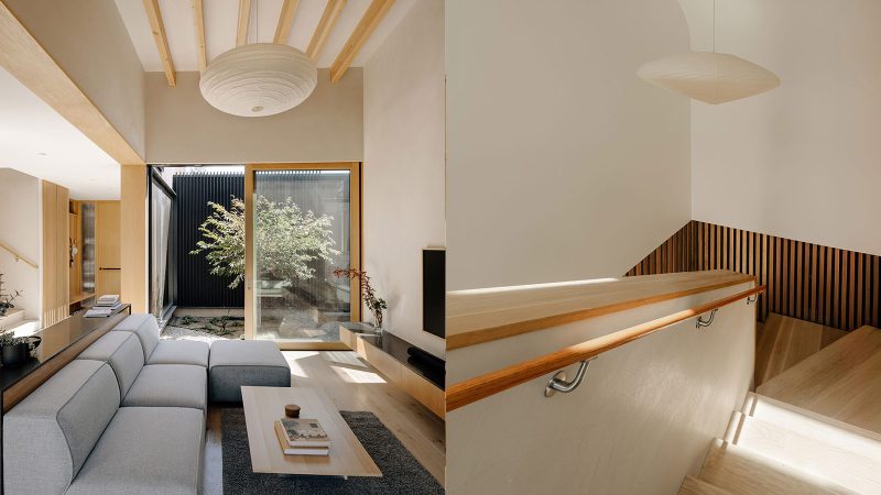 Cupertino Courtyard House exterior by SHED Architecture, featuring white stucco walls and charred-wood upper volume surrounded by lush courtyards.