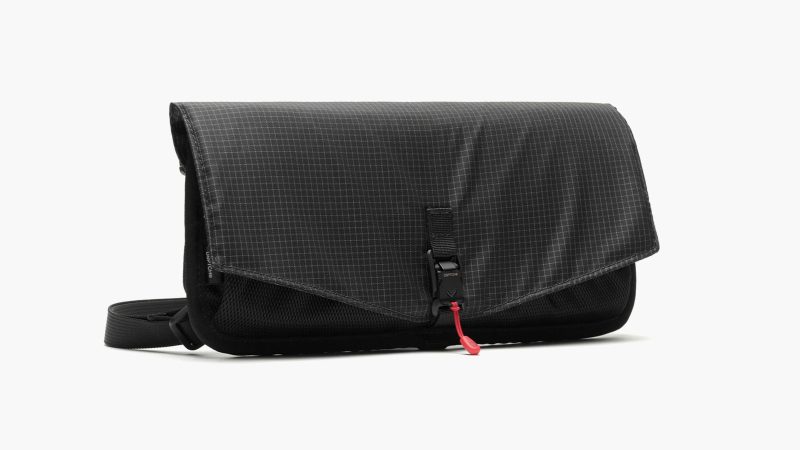 The DSPTCH Switch 2 Case features a Fidlock buckle closure, durable nylon construction, and a minimalist design for protecting the Nintendo Switch 2.