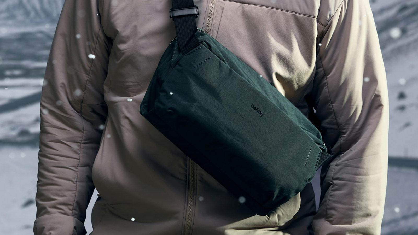 Bellroy sling bag in waterproof green fabric, perfect for carrying essentials from trail hikes to city errands.