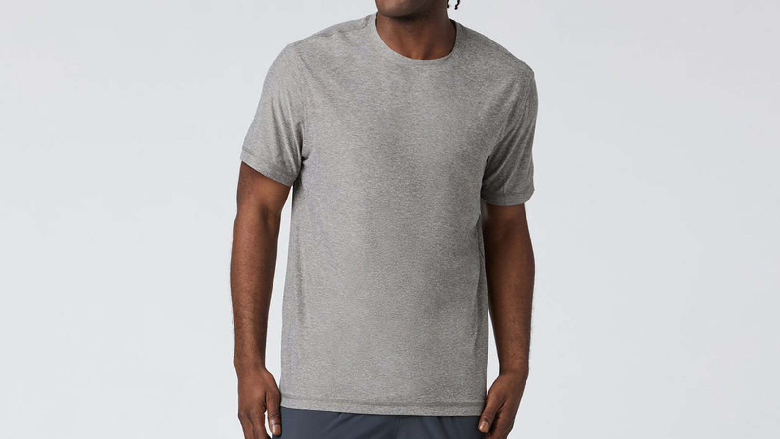 Heather grey Vuori tech tee for men, breathable and stylish for fall adventures and casual city wear.