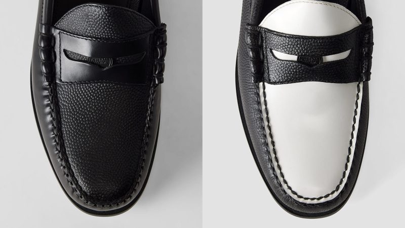 The G.H. Bass × Reigning Champ Larson Weejuns loafer in black Horween pebbled basketball leather, hand-painted white lacquered sole, beefroll stitching, and co-branded coin.