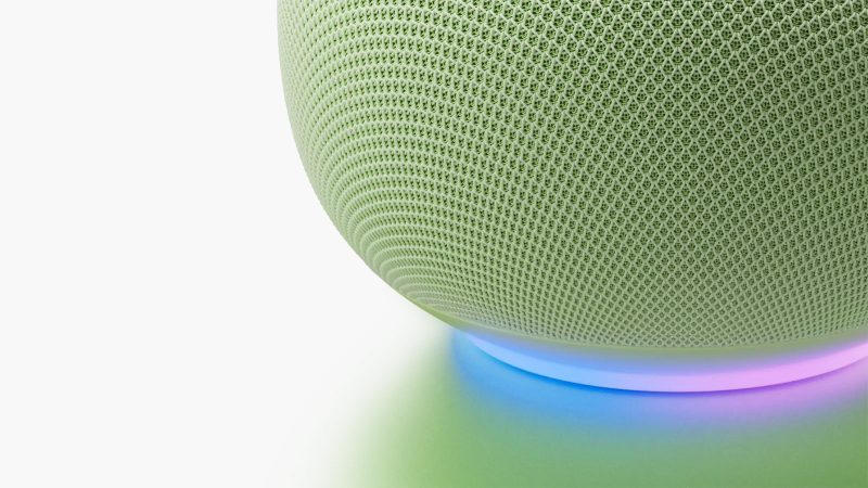 The Google Home Speaker 2026 with Gemini AI showcases its eco-friendly fabric design and light ring for real-time AI feedback.