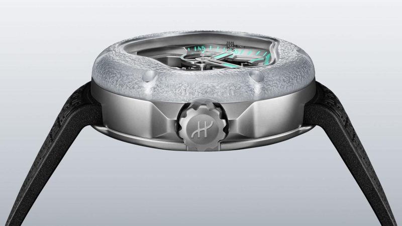 The Hublot MP-17 Meca-10 Arsham Splash Titanium Sapphire watch boasts a fluid design, green accents, and a transparent sapphire case, limited to 99 pieces.