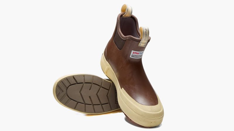 The Huckberry x XTRATUF Legacy Elevate Deck Boot boasts waterproof construction and is designed for comfort, traction, and all-weather versatility.