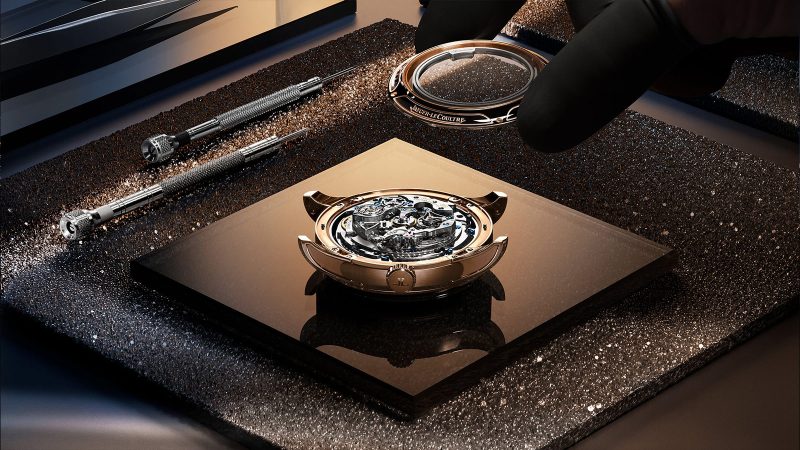 The Jaeger-LeCoultre Master Hybris Artistica Caliber 945, crafted in pink gold, features a domed enamel dial, a celestial star chart, and a flying Cosmotourbillon.