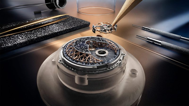 The Jaeger-LeCoultre Master Hybris Artistica Caliber 945, crafted in pink gold, features a domed enamel dial, a celestial star chart, and a flying Cosmotourbillon.