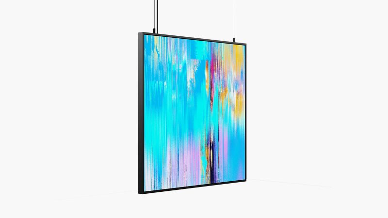 Layer Canvas ultra-high-resolution digital art display mounted in a minimalist living room, true black screen, and wide color gamut.