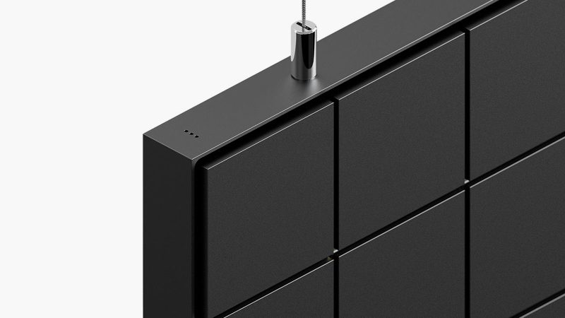 Layer Canvas ultra-high-resolution digital art display mounted in a minimalist living room, true black screen, and wide color gamut.