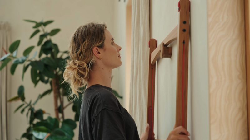 The Leandesk Bamboo Folding Sit-Stand Desk is crafted from an adjustable bamboo surface and foldable frame.