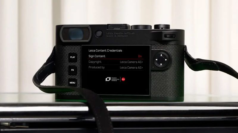 The Leica M EV1 full-frame digital camera in black metal, showing minimalist front panel without rangefinder window and 5.76-million-dot EVF.