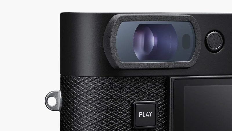 The Leica M EV1 full-frame digital camera in black metal, showing minimalist front panel without rangefinder window and 5.76-million-dot EVF.