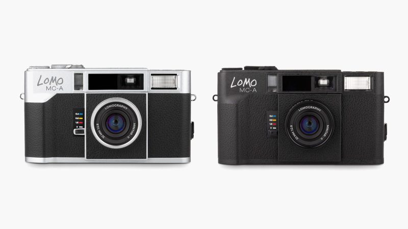 Lomo MC-A 35 mm Film Camera available in black and silver metal with retractable 32 mm f/2.8 lens and built-in flash.