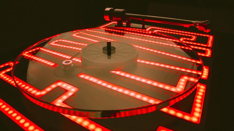 The Pro-Ject Elvis limited edition turntable features a glass platter, a Sumiko Rainier MM cartridge, a CNC plinth, and Elvis-inspired artwork.