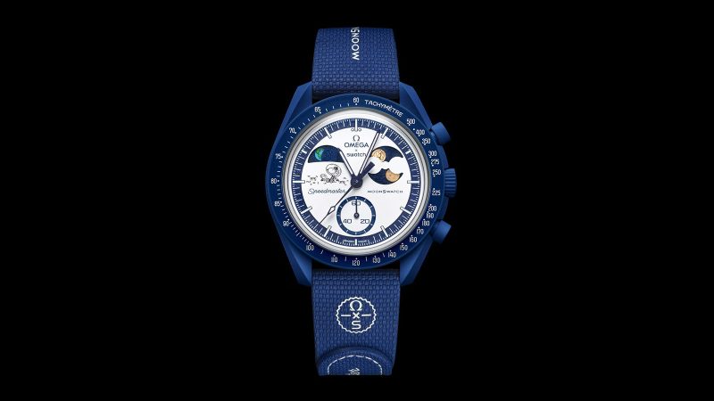 The Swatch Mission to Earthphase Moonshine Gold watch boasts a glowing Earth indicator and Moonshine Gold moon phase design.