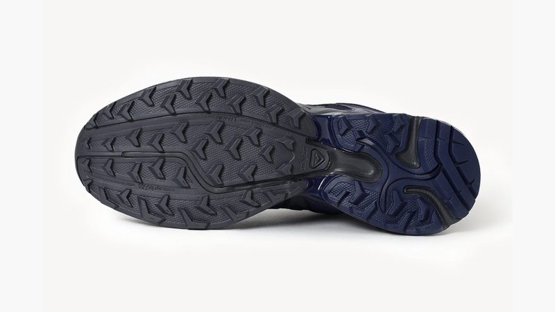 The Salomon x Beams XT Whisper sneaker collaboration showcases minimalist design and high-performance trail-inspired features.