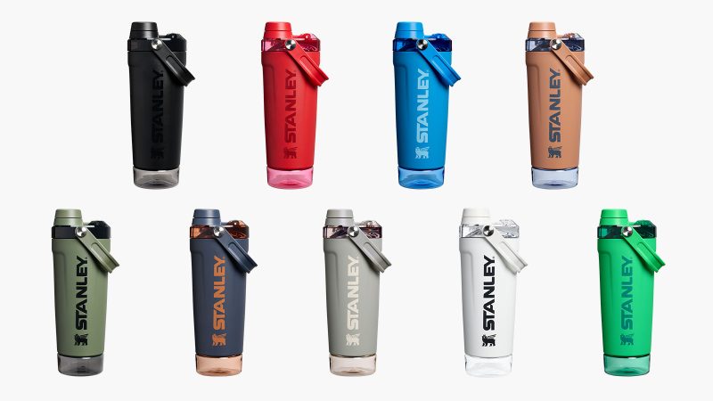 The Stanley Activate Shaker Bottle 20 oz in matte black, stainless steel insulated body, fast-flow spout, base container for supplements, and soft ergonomic carry handle.